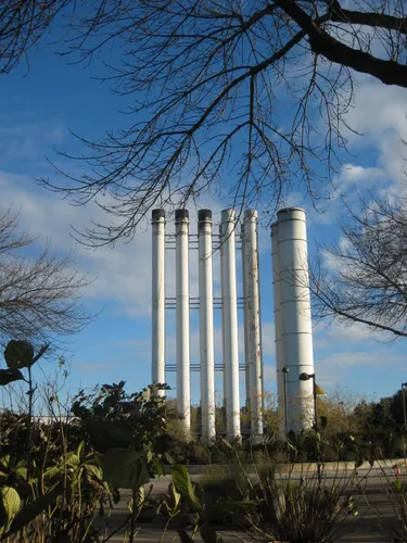 Distinctive white ventilation towers stand tall against the blue sky
