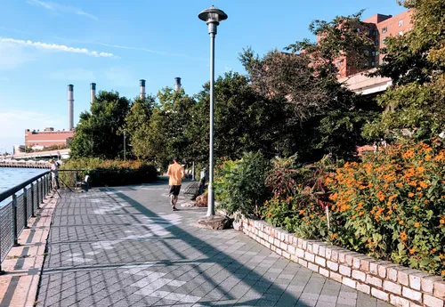 A jogger enjoys this fine morning by the waterfront