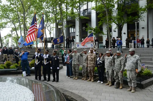 Military service members gather at the New York Vietnam Veterans Memorial Plaza