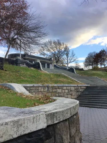 Steps of the former Bronx Borough Hall lead up toward the northwest section of the park