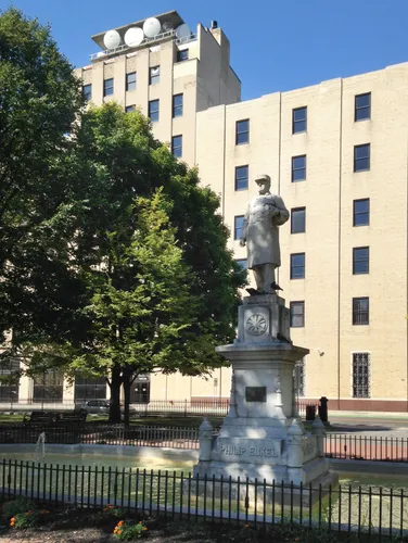 The Philip Eckel Memorial in the center of the park honors Syracuse's legendary fire chief