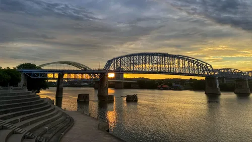 Purple People Bridge glows on an early morning over the Ohio River