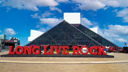 The pyramid design of Rock & Roll Hall of Fame against blue skies