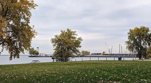 A quiet stretch along the Lake Erie shoreline framed by autumn foliage