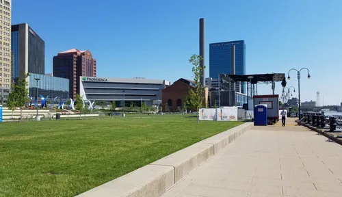 Open green lawns stretch along the Maumee River promenade