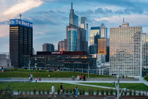 The Philadelphia skyline visible from Cira Green's elevated rooftop location