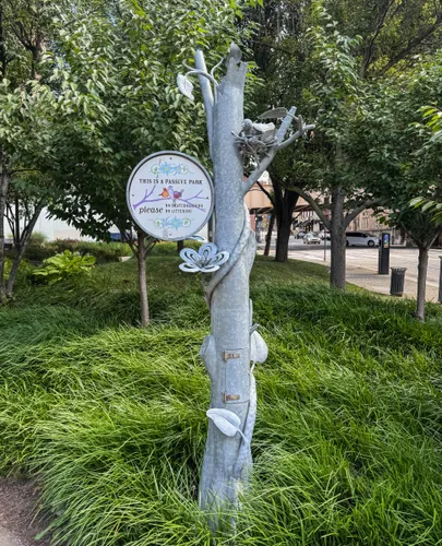 Decorative tree sculptures like this mark the park entrances