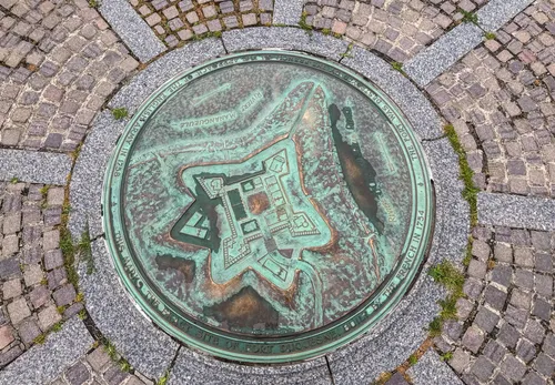 A bronze marker shows the 1754 footprint of Fort Duquesne at the confluence of the Allegheny and Monongahela rivers