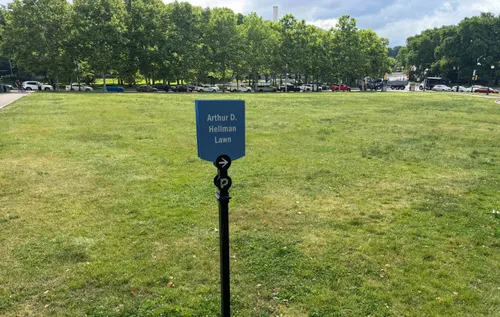 A sign marks the Arthur D. Hellman Lawn at Schenley Plaza