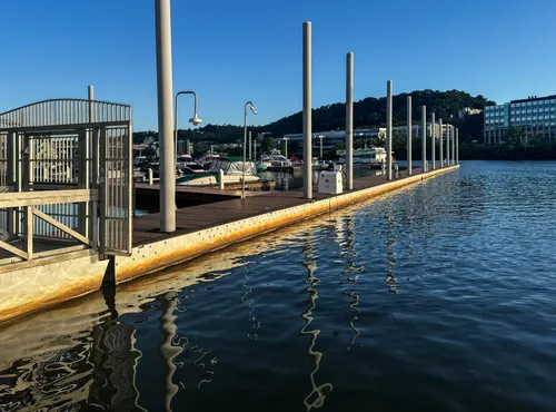 Boat slips and dock structures at South Side Marina on a clear day