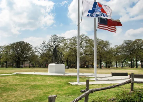 American and Texas flags fly proudly at the memorial plaza