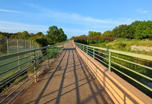 This walkway with railings runs alongside Shoal Creek