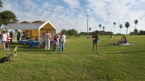 Visitors gathering in the park on a late afternoon