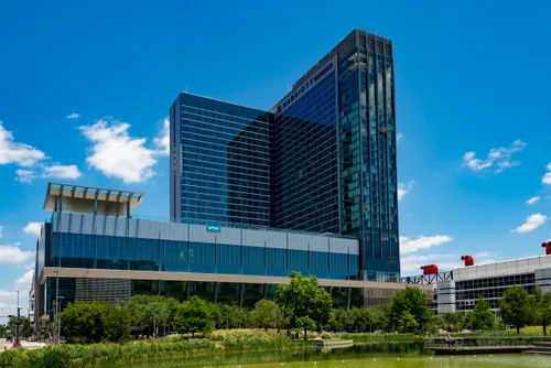 Marriott Hotel's glass towers rise behind Kinder Lake