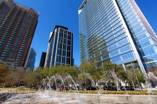 Water features with modern architecture behind