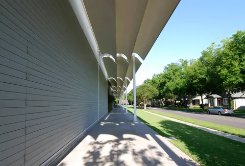 Sunlight casts shadows along the Menil Collection's futuristic white exterior