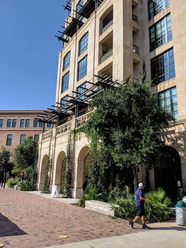 Brick pathways and greenery surround the renovated Pearl brewery complex