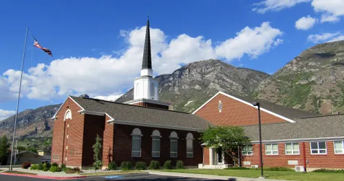The Church of Jesus Christ of Latter-day Saints stands across from the park