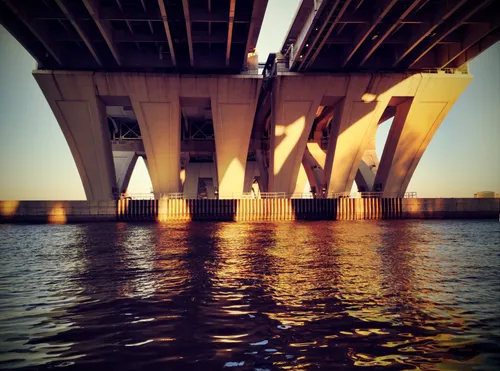 Sunset illuminates the underside of Woodrow Wilson Bridge