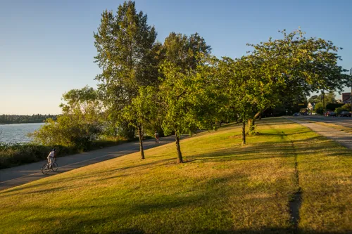 Gentle slope leads down toward the lake at sunset