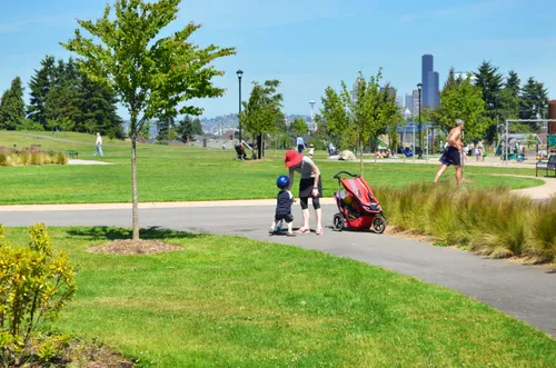 Walking paths through carefully landscaped grounds with city views