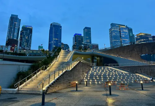 The Salish Steps cascade down toward Elliott Bay at dusk