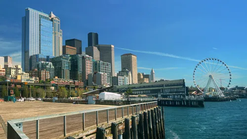 Pier 62 with downtown's skyline and the Seattle Great Wheel rising behind
