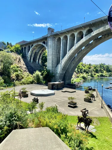 Monroe Street Bridge with the Salmon Chief sculpture visible bottom right