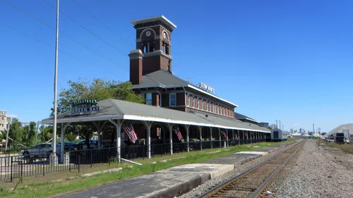 Historic train station building with clock tower