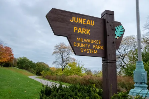 The park sign marks its place within the Milwaukee County Park System