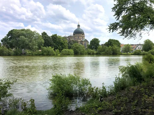 The Basilica of Saint Josaphat can be seen beyond the park's southern treeline