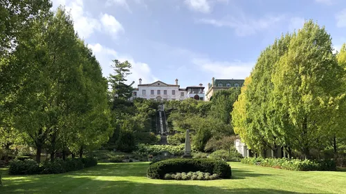 Villa Terrace's formal gardens and historic Italian Renaissance facade seen from the lawn